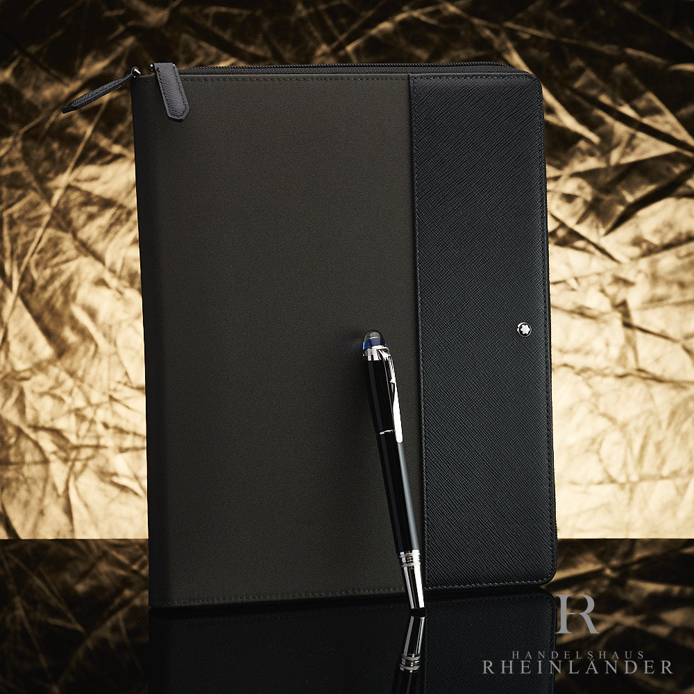 Montblanc Augmented Paper Set mit Starwalker Stift vor goldenem Hintergrund