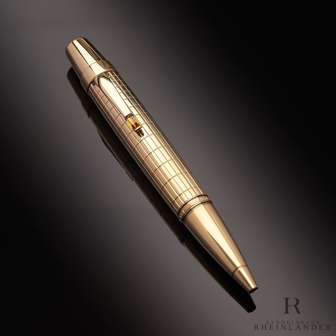 Montblanc Gold Plated Citrin Kugelschreiber auf schwarzem Tisch
