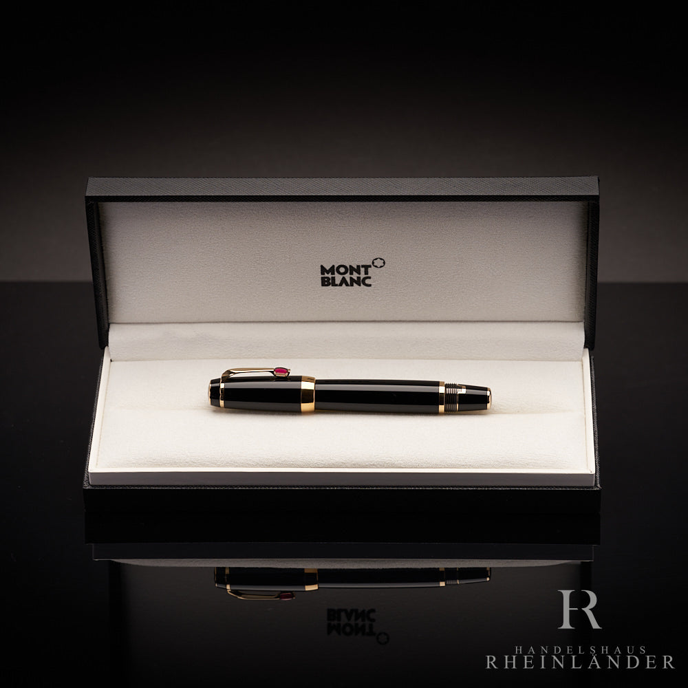 schwarzer Montblanc Boheme Rouge Gold Füller in Geschenkbox auf schwarzem Tisch