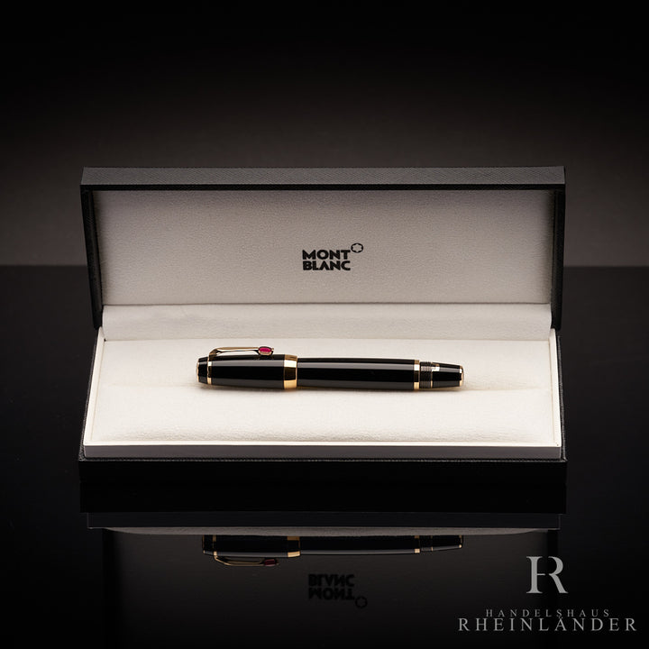 schwarzer Montblanc Boheme Rouge Gold Füller in Geschenkbox auf schwarzem Tisch