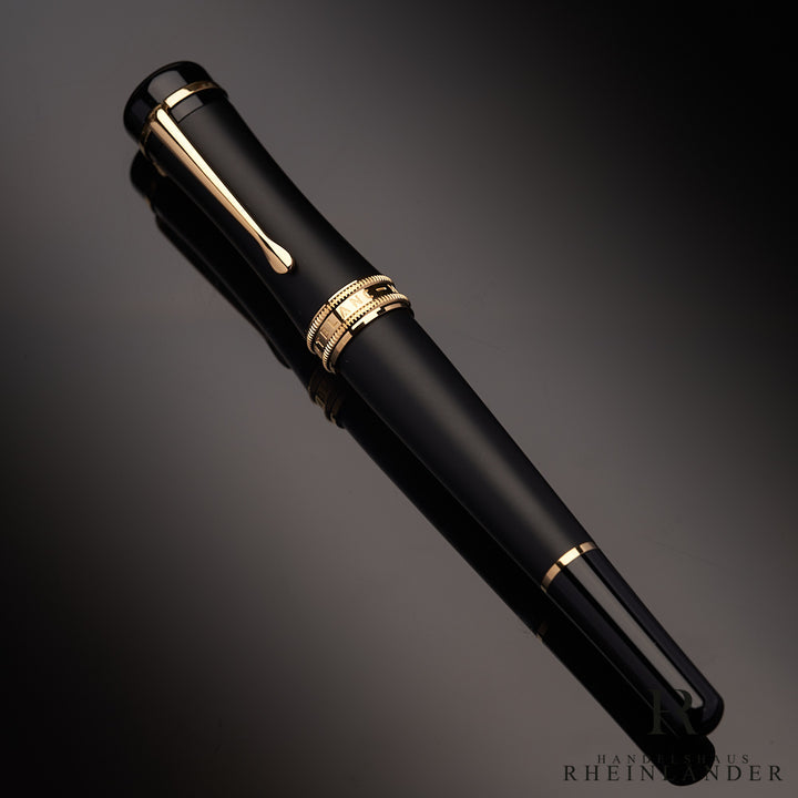Montblanc Bonheur Nuit Rollerball auf schwarzem Tisch