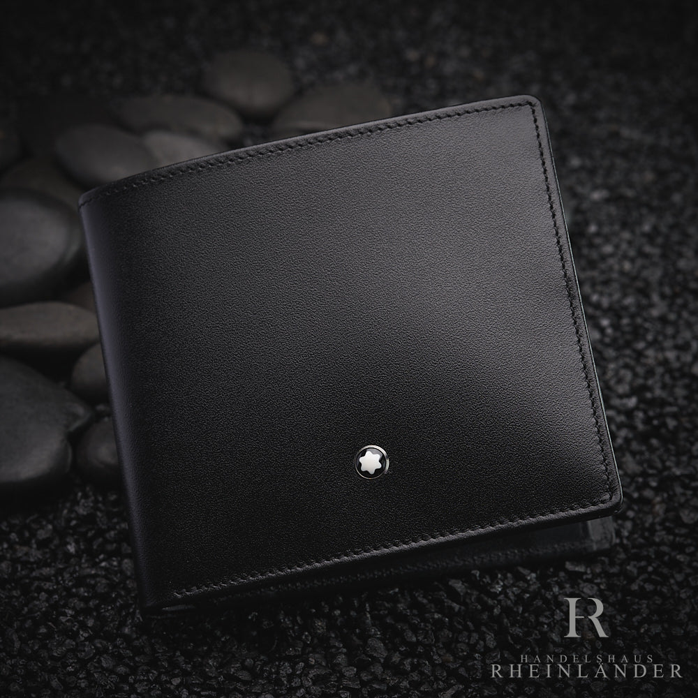 Montblanc Portemonnaie aus schwarzem Leder auf dunklem Kies