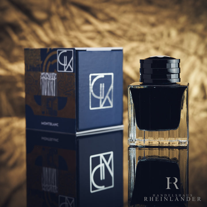 Montblanc Gustav Klimt Tintenfass mit Verpackung vor goldenem Hintergrund