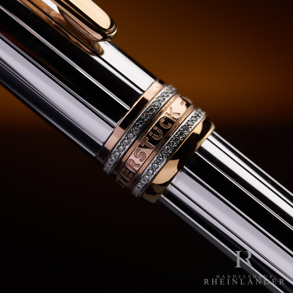 Nahaufnahme der goldenen Kappenringe mit Diamantbesatz am Montblanc Limited Edition Anniversary Kugelschreiber