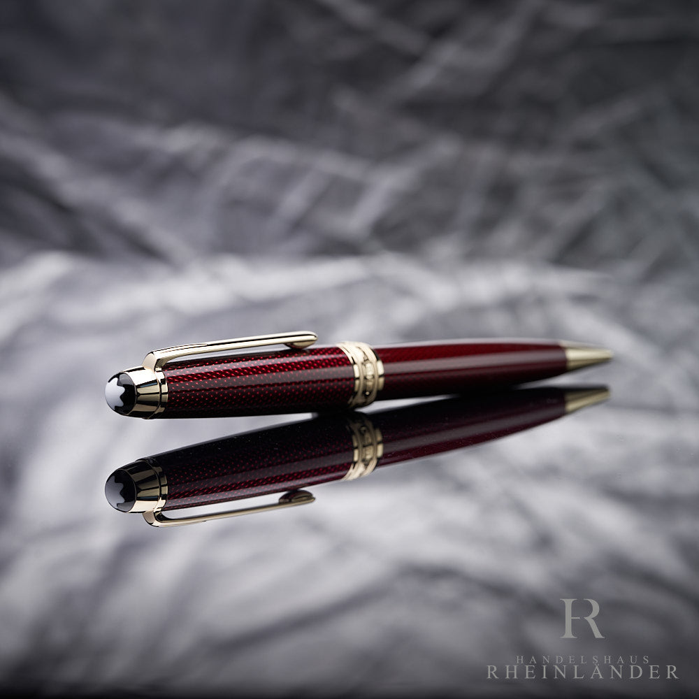 Montblanc Golden Hour Kugelschreiber liegend mit der Kappe und Emblem voran