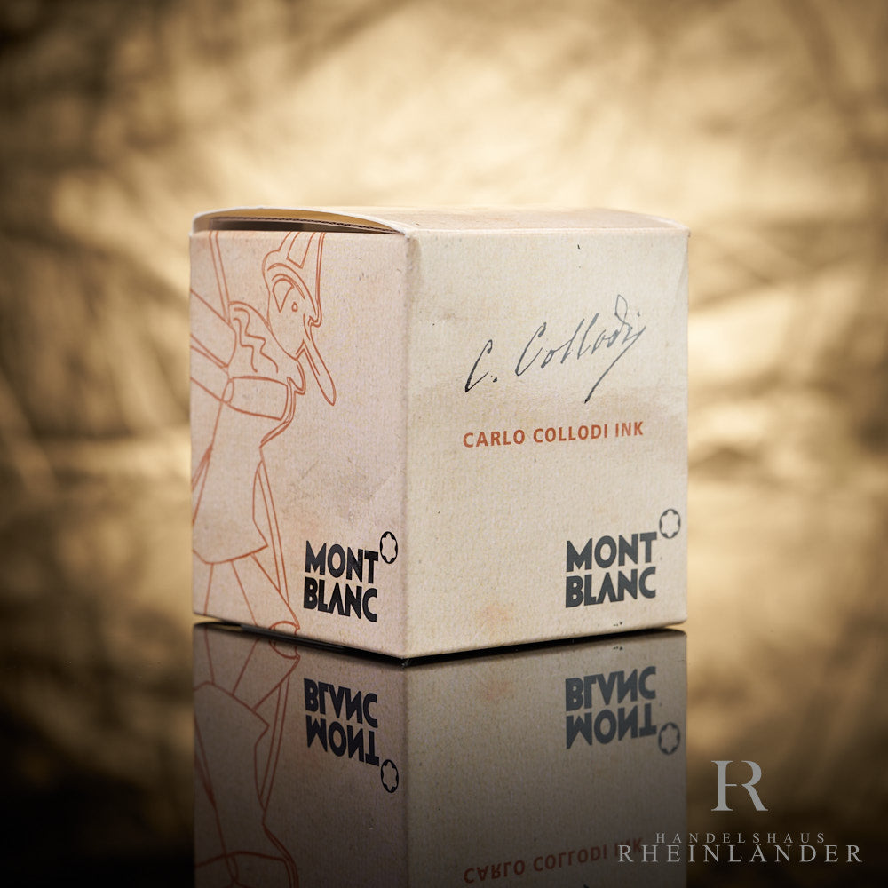 Originalkarton der Montblanc Carlo Collodi Tinte aus der Writers Edition mit Beschriftung vor goldenem Hintergrund